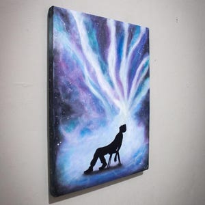 Glow in the dark painting of a man with cosmic energy bursting from his head, psychedelic galaxy wall art