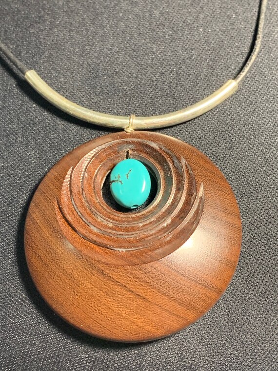 Turquoise Carved Wood Pendant - image 1
