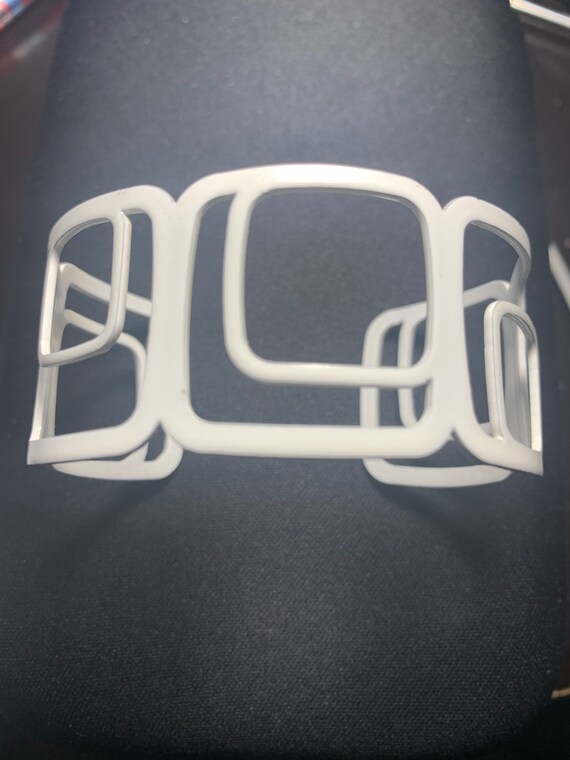 Vintage white metal art Gem