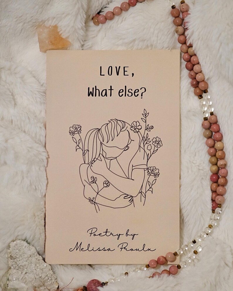 May include: A beige book with the title "LOVE, what else?" and a line drawing of a couple embracing. The book says "Poetry by Melissa Proulx" at the bottom.