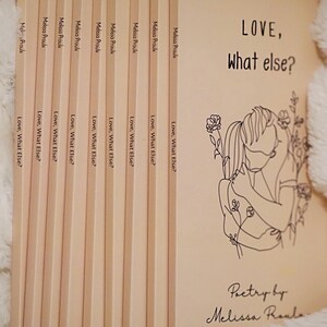 May include: A stack of beige paperback books with the title "LOVE, What else?" and the author's name "Melissa Proulx" on the cover. The cover features a line drawing of two people embracing.