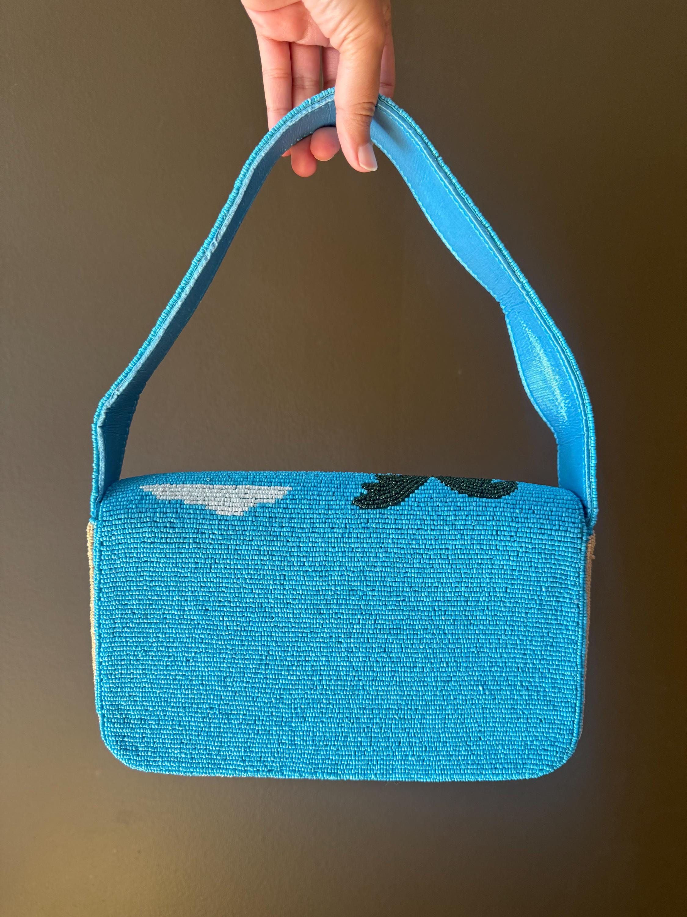 the best beaded bag section 😍 the beach scene had to come  Viral Hand-Beaded Beach Scene Shoulder Bag - Ivory & Blue main image 1