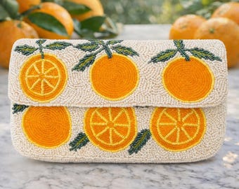 Oranje clutch met kralen, citrusgeborduurde zomerse statement portemonnee