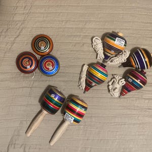 Mexican toy. Mexican Wooden toys. Balero, Yo-Yo, Spinning.