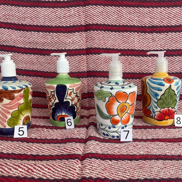 Mexican ceramic soap dispenser with a beautiful design.