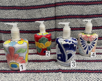 Mexican ceramic soap dispenser with a beautiful design.