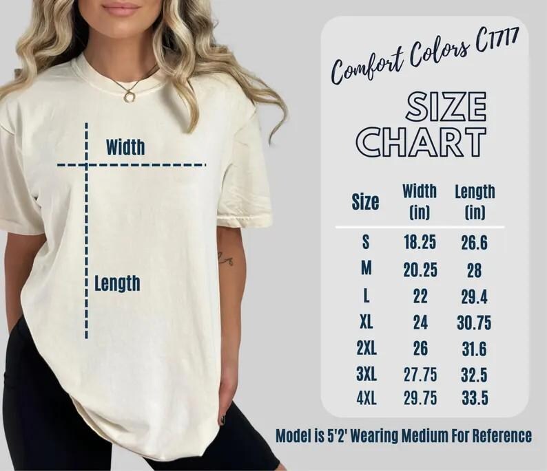 May include: A cream-colored t-shirt with a size chart, labeled "Comfort Colors C1717." The chart displays measurements in inches for width and length, ranging from size small to 4XL. The model is wearing a medium for reference.