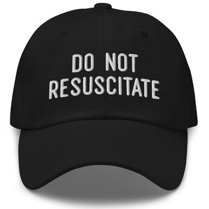 May include: Black baseball cap with white embroidered text that reads "DO NOT RESUSCITATE".