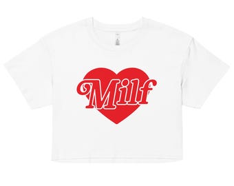 May include: White cropped t-shirt with a red heart graphic that says "MILF" in a retro font.