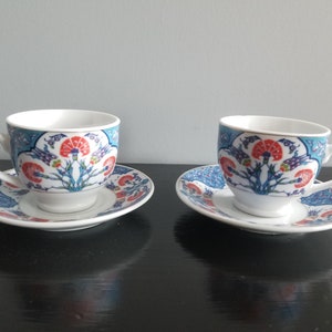 Pair of Chinoiserie Teacups with Saucers