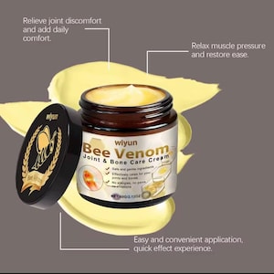 May include: A jar of "Bee Venom Joint & Bone Care Cream" with a black lid. The jar is brown with white and gold text. The cream is yellow and the lid has a gold bee design. The text on the jar says it is 2.12 oz.