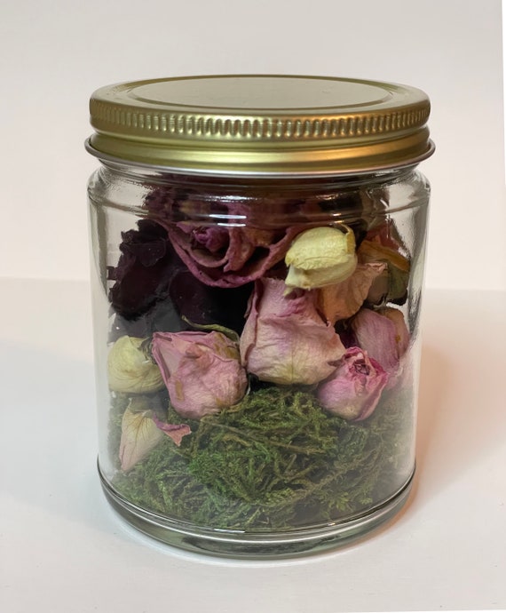 Dried rose petals in storage jar – License Images – 11233217