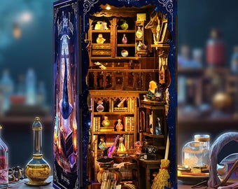May include: A miniature wooden dollhouse with a dark blue exterior and a starry sky design. The interior is a detailed replica of a wizard's workshop, complete with shelves of potions, books, and a cauldron.