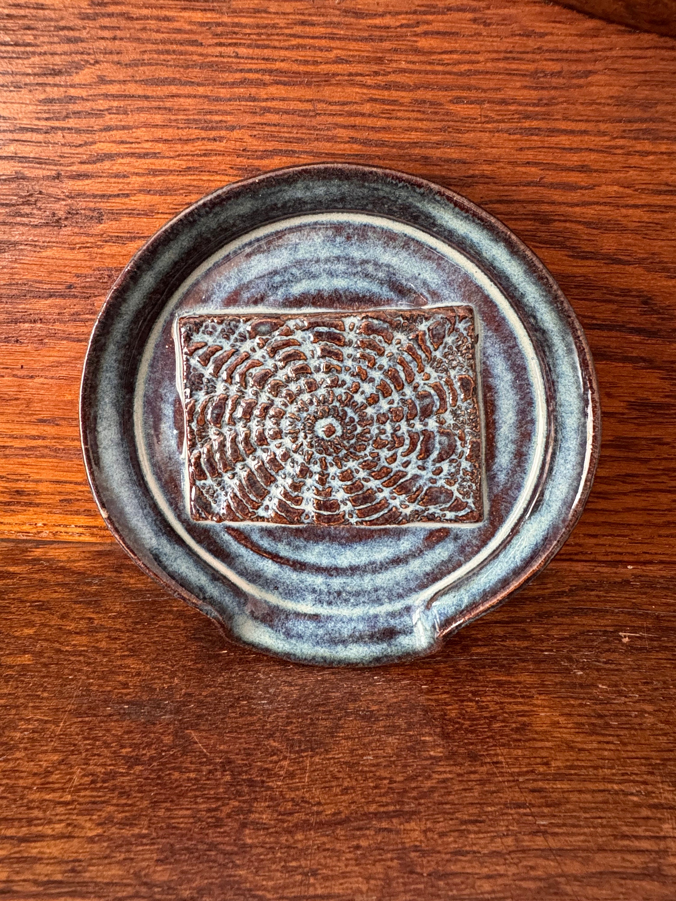 Colorado Spoon Rest: Handmade, hand glazed. Microwave and dishwasher safe. Blue/brown glaze over brown clay.   Artist signed