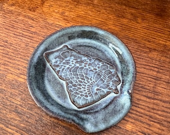 Georgia Spoon rest: Handmade, hand glazed, heart over a southeast GA. Antique lace inlay, blue/brown glaze.   Artist signed