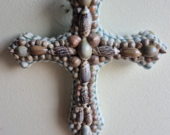 A Seashell  Cross designed and hand-crafted in the USA.