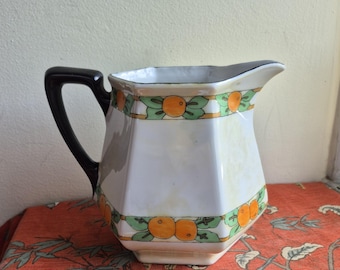 Jarra de sidra de porcelana Art Déco Lusterware, marcada como "Made in Germany", de la década de 1930.