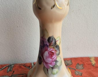 An  Nippon Hand-Painted Lusterware hat pin holder.