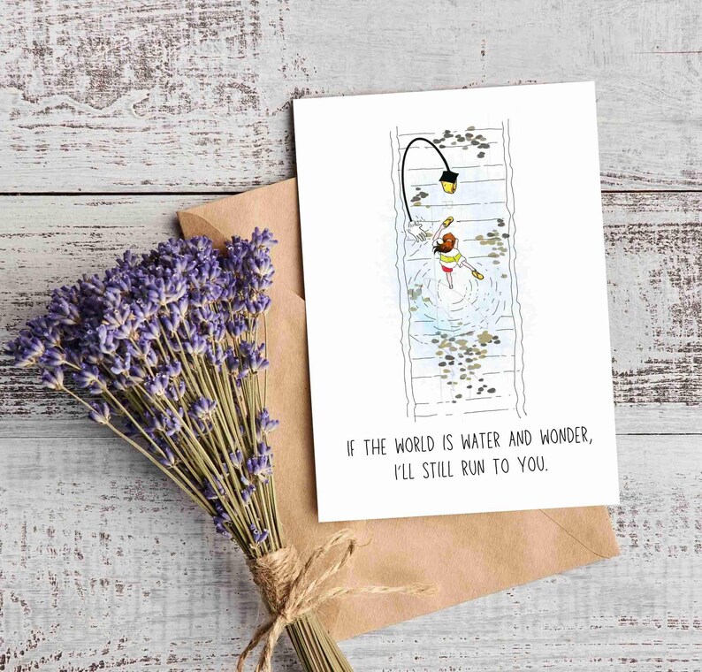 Greetings card with an illustration of Chihiro from Spirited away, Ghibli movie. She is running on rail tracks, which are under water, along with a walking street lamp. The card has a minimalist vibe with a phrase under the image that says " If the world is water and wonder, I will still run to you". The back of the card also has a phrase that says " Even through the quiet and the unknown, I'd follow you anywhere- step by step, heart by heart". It is a Studio Ghibli fan art greetings card.