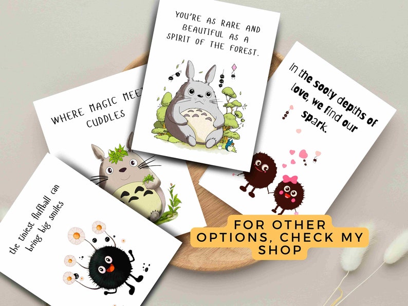 May include: A collection of greeting cards with whimsical illustrations and text. The cards feature characters and phrases like "You're as rare and beautiful as a spirit of the forest." and "Where magic meets cuddles."