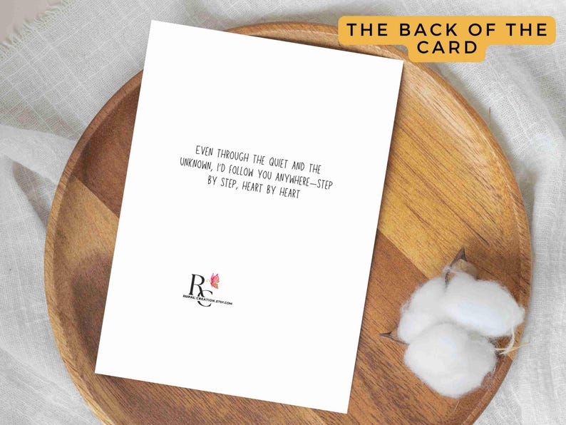 Greetings card with an illustration of Chihiro from Spirited away, Ghibli movie. She is running on rail tracks, which are under water, along with a walking street lamp. The card has a minimalist vibe with a phrase under the image that says " If the world is water and wonder, I will still run to you". The back of the card also has a phrase that says " Even through the quiet and the unknown, I'd follow you anywhere- step by step, heart by heart". It is a Studio Ghibli fan art greetings card.