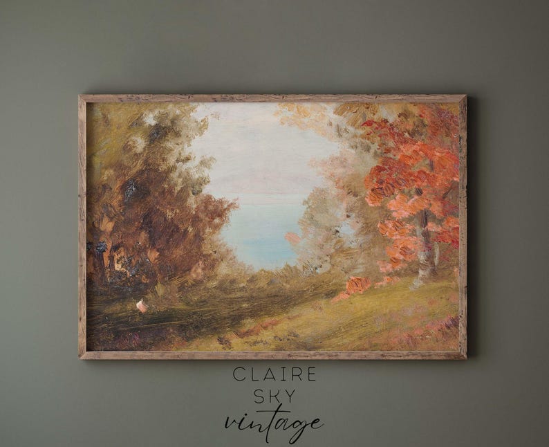 Puede incluir: Una pintura enmarcada que representa una escena de paisaje con &aacute;rboles y un lago en el fondo. Los &aacute;rboles est&aacute;n pintados en tonos de marr&oacute;n, verde y rojo. El lago es de color azul claro. La pintura est&aacute; en un marco de madera.