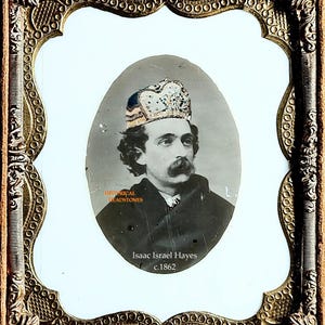 May include: A vintage oval portrait of Isaac Israel Hayes c.1862, featuring a person with a mustache wearing a patterned cap and dark coat. The portrait is encased in an ornate, rectangular, metallic gold-toned frame with intricate embossed details.