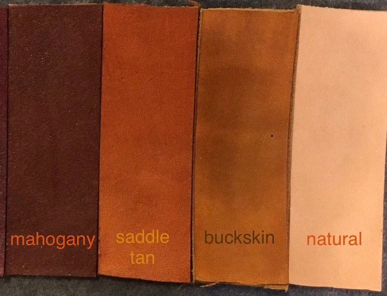 May include: Four leather swatches in different colors: mahogany, saddle tan, buckskin, and natural.