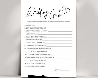 May include: A white sheet of paper with the title "Wedding Gab" in cursive, accompanied by a heart. The sheet contains a list of phrases to solve, with blank spaces. A black pen is placed at the bottom.