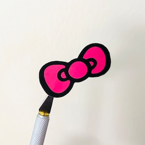 Adesivo per papillon fustellato rosa femminile