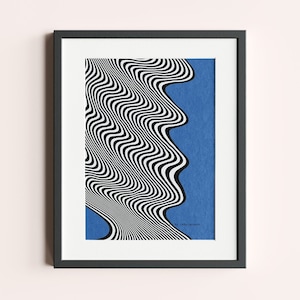 May include: A framed print with a black and white optical illusion design on a blue background. The print is titled "The Presence".