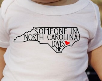 Someone In North Carolina Loves Me Bodysuit, Cute Baby Shirt, Baby Shower Gifts, Loved Baby T-shirt, State Baby Bodysuit, Baby Announcement