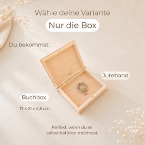 May include: An open light-colored wooden box with a hinged lid, containing a small coil of jute twine. The text on the image includes 'W&auml;hle deine Variante', 'Nur die Box', 'Du bekommst:', 'Juteband', 'Buchbox', '17 x 21 x 4,5 cm'.