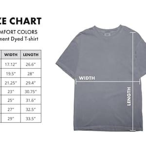 May include: A grey short-sleeve t-shirt with a size chart titled SIZE CHART COMFORT COLORS Garment Dyed T-shirt. The chart lists sizes S through 4XL with corresponding width and length measurements in inches, ranging from 17.12 to 33.5 inches.