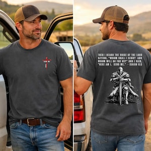 May include: A charcoal gray t-shirt featuring a small red cross graphic with the text SEND ME on the front. The back displays a graphic of a knight kneeling with a sword and the text: THEN I HEARD THE VOICE OF THE LORD SAYING, WHOM SHALL I SEND? AND WHOM WILL GO FOR US? AND I SAID, HERE AM I. SEND ME. - ISAIAH 6:8