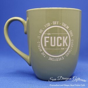 May include: A trio of speckled ceramic mugs in light blue, cream, and grey. These mugs have a matte finish and a simple, modern design. Each mug has a comfortable handle for easy use.