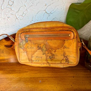 May include: A rustic wooden sign with the text "Welcome to our home" in white lettering. The sign features a distressed finish and a simple, inviting design, perfect for entryway decor.