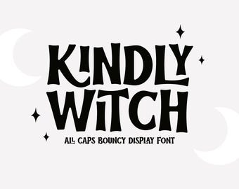 May include: A graphic design featuring the words "KINDLY WITCH" in a bold, black, all-caps font. The design includes crescent moons and star accents on a light gray background. The text "ALL CAPS BOUNCY DISPLAY FONT" is below.