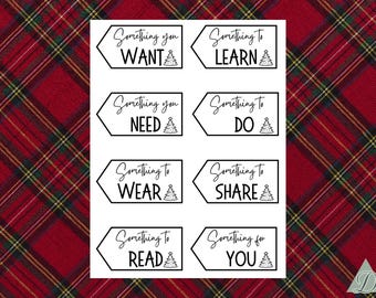 Puede incluir: Etiquetas de regalo blancas con texto negro y un gráfico de árbol de Navidad. Las etiquetas dicen: "Something you WANT", "Something to LEARN", "Something you NEED", "Something to DO", "Something to WEAR", "Something to SHARE", "Something to READ" y "Something for YOU".