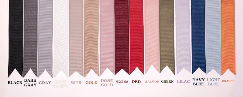 May include: A selection of ribbon spools in various colors, including black, dark gray, gray, off-white, mink, gold, rose gold, burgundy, red, salmon, green, lilac, navy blue, light blue, and orange.