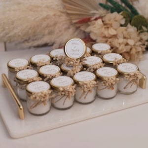 Custom designed wedding, engagement, baptism, and Sweet 16 candles! Personalize with names and date