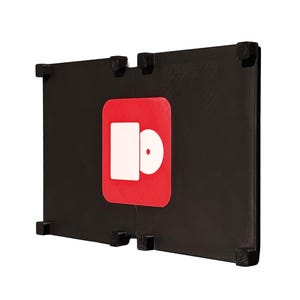May include: Black rectangular object with a red square and white graphic. The object has four black corner pieces and four black square pieces on the top. The white graphic is a rectangle and a circle.