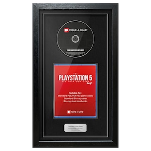 May include: Black framed display for a video game disc and case. The top section has a circular space for a disc, and the bottom section has a red and white PlayStation 5 game case. The frame includes the text "FRAME-A-GAME".