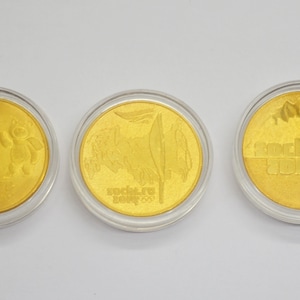 Lot 3 commemorative coins of the Sochi 2014 Olympics.gold plated