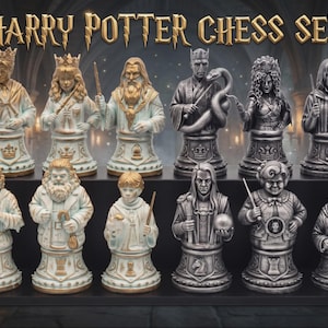 May include: A Harry Potter chess set featuring twelve detailed character busts arranged on a black display stand. The set includes six white and gold pieces and six silver and grey pieces, each depicting a different character holding a wand or object.