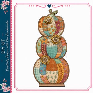 May include: A DIY kit featuring a vertical stack of three pumpkins with a patchwork design in orange, teal, yellow, and cream. The pumpkins are decorated with floral and plaid patterns and three wooden sunflower accents. Text reads DIY KIT.