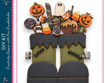Kit de manualidades de madera para decorar estantes con forma de bota de dulces de Halloween.