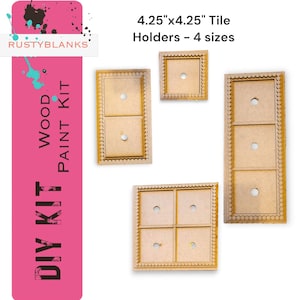 May include: A DIY wood paint kit featuring four light brown wooden tile holders in different configurations. The text on the pink side panel reads RUSTYBLANKS WOOD PAINT KIT and 4.25"x4.25" Tile Holders - 4 sizes. Each holder has small circular cutouts.