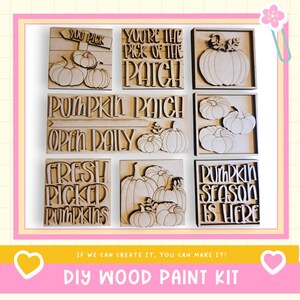 May include: Wooden DIY paint kit featuring pumpkin-themed signs with phrases like "You Pick," "Pumpkin Patch," and "Fresh Picked Pumpkins." The kit includes various pumpkin designs and text, perfect for fall decor.