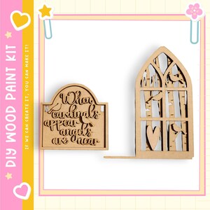 a wooden cutout of a bird and a wooden cutout of a window, both of which appear to be part of a larger wooden craft kit.
